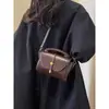 Nuevo bolso de mano para mujer 2026, moderno y de alta gama, moda nicho, bolso versátil de hombro y cruzado, popular bolso cuadrado pequeño