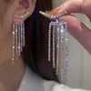 Aretes Largos para Mujer con Borla y Pedrería Clavo de Oreja de Gama Alta Diseño Nuevo Distintivo Joyería para Orejas Dorada