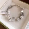 Pulseira de Rede Azul Dourada com Flor de Vidro Pérola Zircônia Brilhante Pulseira Elegante de Luxo Leve Joia de Mão Versátil da Moda