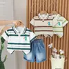 Conjunto de Ropa de Verano para Niños 2026 Nuevo Estilo Bebé Lactante Delgado Camisa POLO de Manga Corta Conjunto de Dos Piezas Ropa Guapa para Bebé Moderna