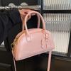 Bolsa popular deste ano feminina 2025 novo design de nicho rosto brilhante bolsa Boston portátil bolsa de ombro mensageiro