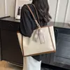 Bolso Nuevo Transfronterizo para Mujer Bolso Tote Urbano Simple de Gran Capacidad Diseño de Nicho Bolso de Hombro para Viajes de Negocios para Mujer