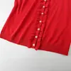 Ropa de Mujer Transfronteriza 2026 Moda Europea y Americana Versátil Cuello Redondo Decorativo en Capas Manga Acampanada Cárdigan de Punto para Mujer M87010
