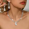 Moda Europea y Americana Verde Azul Rojo Pedrería Conjunto de Collar Pendientes Pulsera Anillo Amazon Estilo Caliente Cuatro Piezas Completamente de Diamante