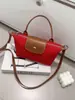 Bolso Cruzado para Teléfono Móvil de Gama Alta para Viajes para Mujeres Modelo Nuevo 2026 Bolso de Tela Roja Bolso Pequeño Tipo Bollo Bolso de Hombro Versátil