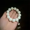 Venta Directa de Fábrica Pulsera de Raíz de Bodhi de Jade Blanco de una Sola Vuelta con Colgante de Loto
