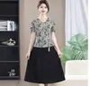 Vestido Falso de Duas Peças para Mãe 2026 Decote V Manga Curta Cintura Marcada Emagrecedor Tamanho Grande Temperamento de Meia-Idade Saia Midi Estampada