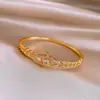Pulsera Redonda Entrelazada Hueca Transfronteriza Europea y Americana, Pulsera de Declaración Moderna y Única, Joyería de Lujo Ligero de Gama Alta para Mujeres