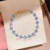 Pulsera con cierre de flor de circonita chapada en oro real de 18k, diseño único, pulsera de nicho, lujo ligero, joyería vintage de alta gama