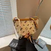 Comércio Exterior Textura de Alta Qualidade Moda Retrô Simples Versátil Bolsa de Ombro Feminina 2025 Verão Nova Bolsa Balde Transversal
