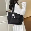 Bolso de lona de moda para mujer 2026 nuevo modelo de gran capacidad, bolso tote simple para estudiantes universitarios, bolso de mano para ir a clase, bolso de hombro