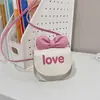 Mini Bolsa Transversal para Meninas Bolsa Fofa com Laço e Letras Bolsa de Ombro Único da Moda Infantil Bolsa Pequena Estilo Ins para Meninas