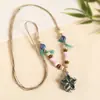 Collar con colgante de campana de mariposa de cerámica de estilo étnico retro para mujer, diseño nuevo y moderno, cadena larga para suéter, accesorios