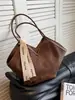 Bolsa de Ombro Versátil Tecida Retrô Transfronteiriça para Mulheres 2025 Nova Moda Casual Bolsa de Ombro Cor Contrastante Bolsa Tote para o Dia a Dia