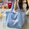 Bolsa de ombro estilo coreano inspirada em ins para estudantes, alta aparência, grande capacidade, leve, casual, bolsa tote para o dia a dia com logotipo estampado
