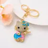 Llavero con Forma de Guitarra de Hello Kitty con Pedrería de Dibujos Animados Lindo Colgante de Gato Llavero Decoración Accesorio