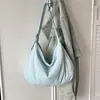 Bolsa de mão da moda e versátil em formato de bolinho para mulheres, nova coleção 2026, bolsa de ombro cruzado, bolsa de axila simples e estilosa, adequada para vendas transfronteiriças