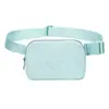 Bolso Lulu del mismo estilo en stock, riñonera antisalpicaduras, riñonera deportiva de nailon para correr, riñonera para teléfono móvil para hombres y mujeres.