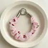 Correa de muñeca de tela a cuadros de cereza fresca para teléfonos móviles, correa corta de mano anti-pérdida, universal para llaves y bolsos