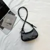 Popular bolsa de hombro de nicho para mujer 2026 nueva elegante versátil bandolera color liso moda bolso de hombro