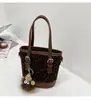 Bolsa Saco Estampa de Leopardo para Mulheres 2026 Outono e Inverno Novo Estilo Bolsa de Ombro Fashion Versátil Bolsa Transversal Nicho Bolsa de Mão