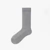 Calcetines de rayas verticales estilo ballet miu calcetines hasta la pantorrilla calcetines de algodón con lazo jk calcetines holgados grises simples versátiles calcetines para niña