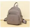 Mochila de gran capacidad para viajes casuales transfronterizos para mujer, tela de nailon a la moda, mochila de una sola pieza para ir al trabajo, envío directo para mujer