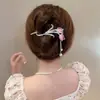 Elegante tulipán de ojo de gato, nuevos accesorios para el cabello, clip de un solo personaje, clip giratorio de celebridad de Internet para mujeres, horquilla de sentido avanzado, clip de agarre para la cabeza posterior