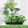 Simulação de paisagismo com plantas verdes jardineira floreira combinação de display flores artificiais biônicas decoração de paisagem interna divisória de planta tropical