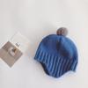Otoño e Invierno Bebé 6-12 meses gorro con orejeras de estilo occidental que combina con todo color sólido 1-2 años bebé niño y niña gorro de lana de punto