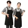 Delantales de lona impermeables personalizados para catering, resistentes a la suciedad, adecuados para hornear en casa y café, ropa de trabajo nueva y elegante, venta al por mayor para comercio exterior