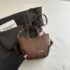 Bolso Cubo Estilo Nuevo Simple Retro Bolso Casual de Moda 2026 Otoño Nuevo Estilo Bolso de Hombro Cruzado Texturizado para Mujer