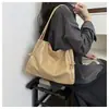 Bolsa Tote Grande Capacidade para o Dia a Dia de Mulheres 2026 Bolsa de Mão Fashion e Estilosa para Mulheres Bolsa de Ombro Versátil de Nicho para Mulheres
