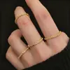 Anillo de cadena blanda brillante transfronterizo europeo y americano para mujer, anillo de metal versátil de moda de alta gama, anillo liso apilable para mujer