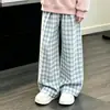 Elegante sudadera preppy de estilo coreano con mangas largas y cuello de muñeca, fina y adecuada para primavera y otoño, combinada con pantalones de cuadros de pierna ancha - un conjunto de dos piezas para niños mayores