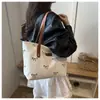 Bolso de hombro cruzado para mujer con lazo dulce 2026 de mezclilla y lona casual de moda de gran capacidad para llevar debajo del brazo