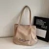 Bolsa de Lona Bordada con Letras de Gran Capacidad Estilo Coreano Estilo Perezoso Nueva Textura 2025 Bolso de Hombro para Axila para Estudiantes Mujeres