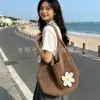 Bolso de Hombro Tejido Hueco de Verano para Mujer 2025 Nuevo Estilo Bolso de Punto con Flor de Hilo Gran Capacidad Bolso Tote