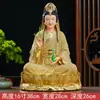 La estatua de Buda de Miaoshan Guanyin Bodhisattva está consagrada en la imitación de mármol blanco, Guanyin Bodhisattva del Mar de China Meridional, sentada en loto en casa y cuidando al taoísta