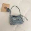 Bolso de Hombro con Hebilla de Cierre de Diseño de Nicho 2026 Nuevo Estilo Bolso de Hombro de Moda Bolso de Motociclista para Chica Popular Bolso de Mano para Viajes