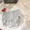 Ropa interior de algodón tipo nube antibacteriana de cintura media fina sin pelusa estilo dulce simple para cadera ropa interior de invierno al por mayor