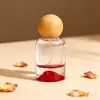 Venta Directa de Fábrica Botella de Perfume de Vidrio Cilíndrica Fondo Volcánico 30ml 50ml 100ml Botella Vacía Botella con Atomizador Fondo Grueso Tapa de Bola