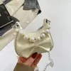 Nudo de lazo elegante 2026 gran capacidad moda nuevo moderno chica popular cadena bandolera perla bolso de mano bolso de hombro