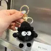 Piel sintética de visón Bola de carbón pequeña Colgante de peluche Llavero de coche Colgante Accesorio pequeño Colgante para bolso de peluche Decoración para mochila