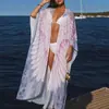 Cubierta de playa europea y americana Estampado de alas Pluma Holgado Manga larga Cardigan de punto Protección solar Cubierta de bikini