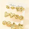 Joyería de Oreja de Venta Caliente Transfronteriza Europea y Americana Metal Geométrico Flor de Amor Set de Pendientes para Mujer Accesorios de Pendientes de Gama Alta