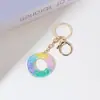 Llavero de Resina Color Arcoíris Letra Inglesa Borla Colgante Creativo Alto Sentido Gota de Pegamento de Cristal Colgante de Bolso