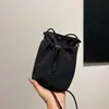 Bolsa minimalista para teléfono móvil para mujer, estilo japonés y coreano, bolsa pequeña de lona ligera con cordón, monederos versátiles mini bandolera para monedas