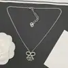 Nuevo Collar Chanel Exquisito Compacto Lazo Doble C para Mujer, Versión Auténtica de Alta Gama con Etiqueta, Fotos Reales