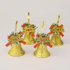 Decoraciones navideñas transfronterizas: lazos dorados con letras inglesas, campanitas, adornos para árbol de Navidad, arreglo de escena navideña